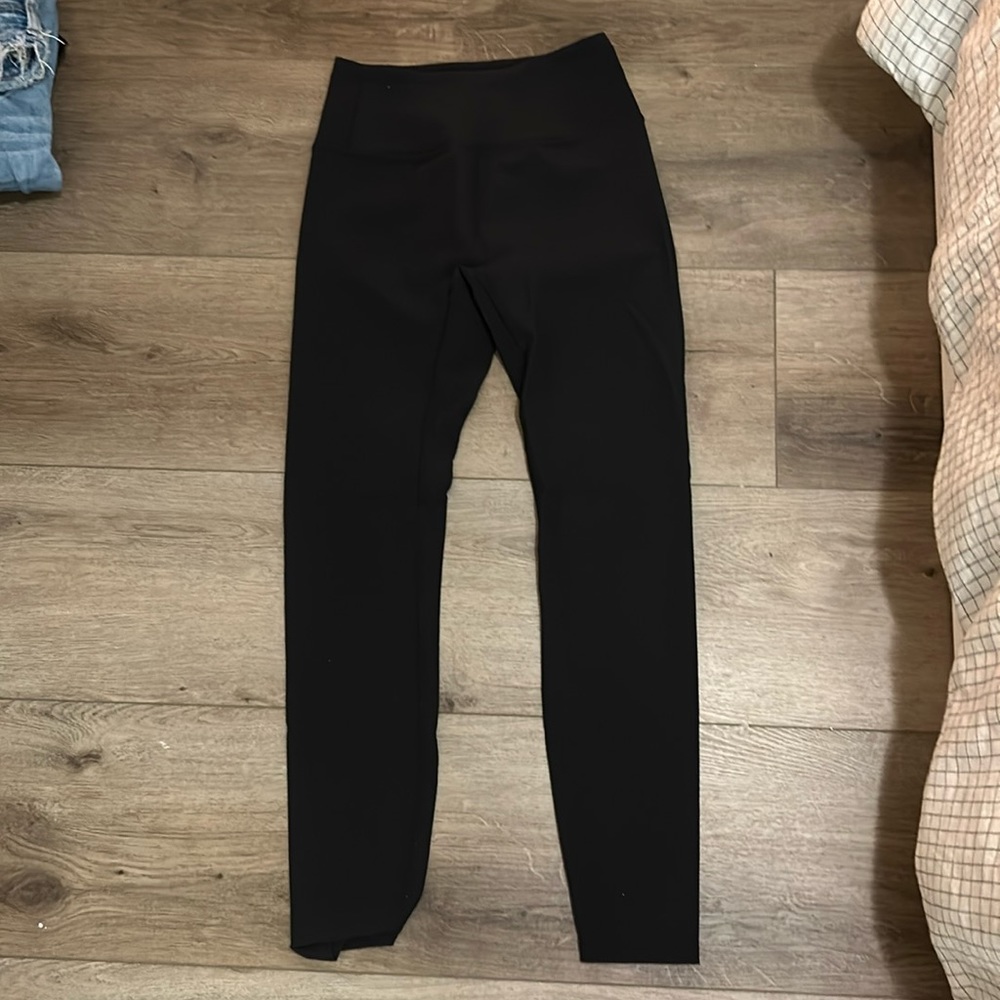 Worn a few times near perfect condition. Ripped black leggings